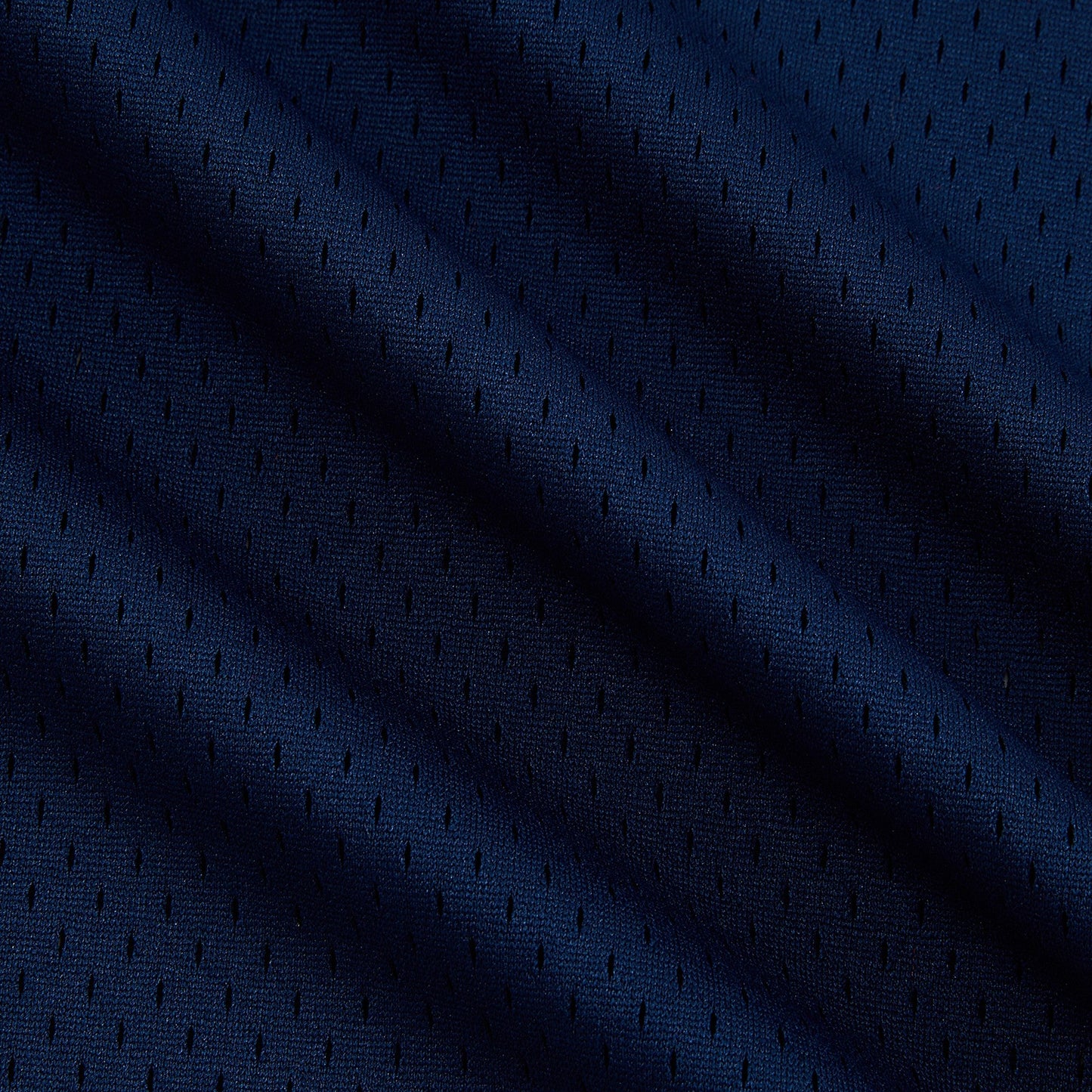 Dark blue fabric with a subtle pattern
