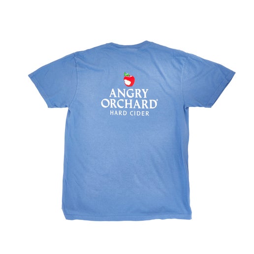 Back of the blue tee features a larger version of what is on the front pocket, the Angry Orchard logo which includes the bitten red apple and writing "Angry Orchard Hard Cider" underneath.