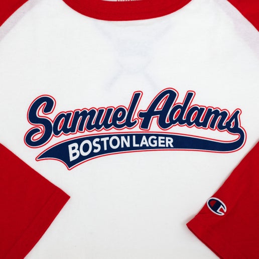 Close up of Red and White Baseball tee with a Samuel Adams Boston Lager logo designed in Retro baseball uniform font