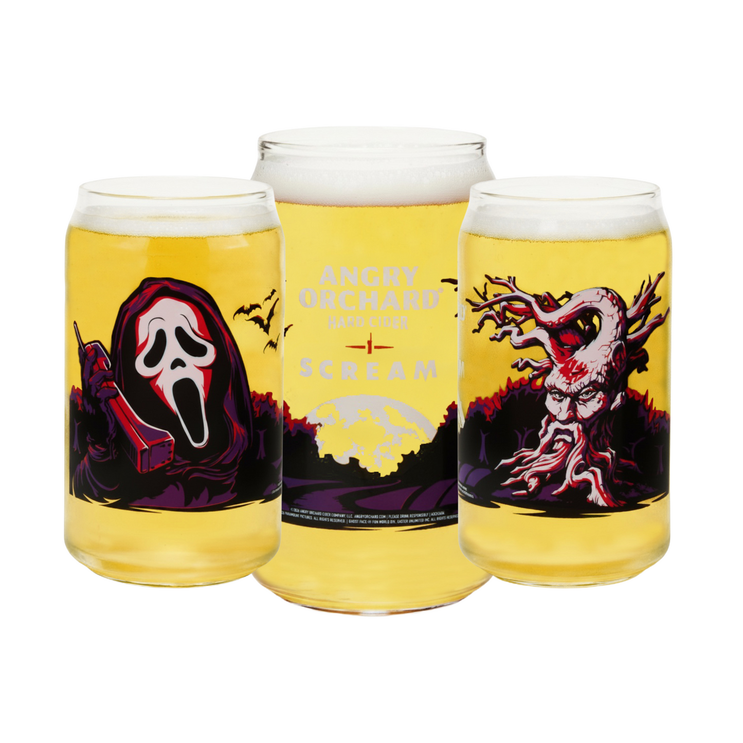 Three frosted glass can-shaped pint glasses filled with golden cider, arranged together on a white background. The left glass shows Ghostface from Scream in a purple and red hooded mask.