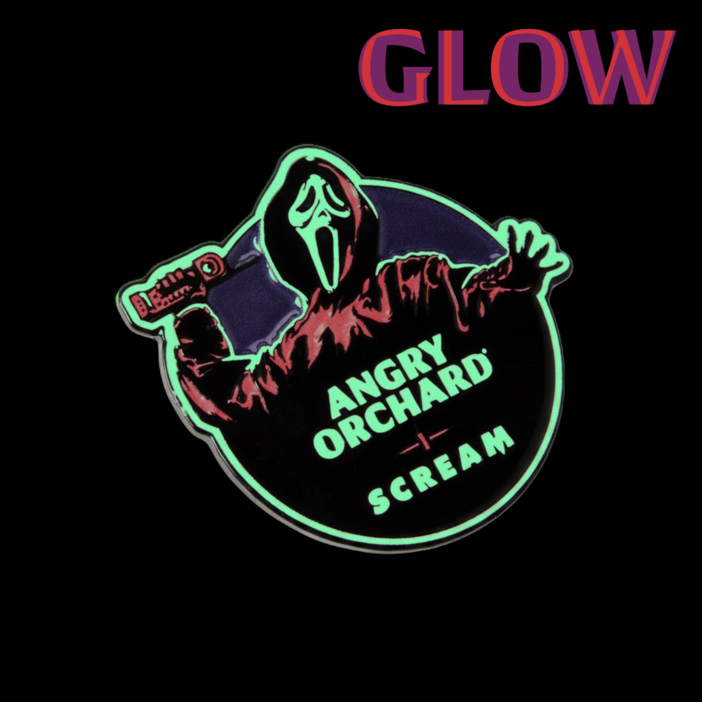 A circular enamel pin featuring a stylized Ghostface figure in a red hoodie holding a knife, with the words 'ANGRY ORCHARD' and 'SCREAM' in glowing green text. The pin is shown on a black background with the word 'GLOW' in pink and purple at the top.