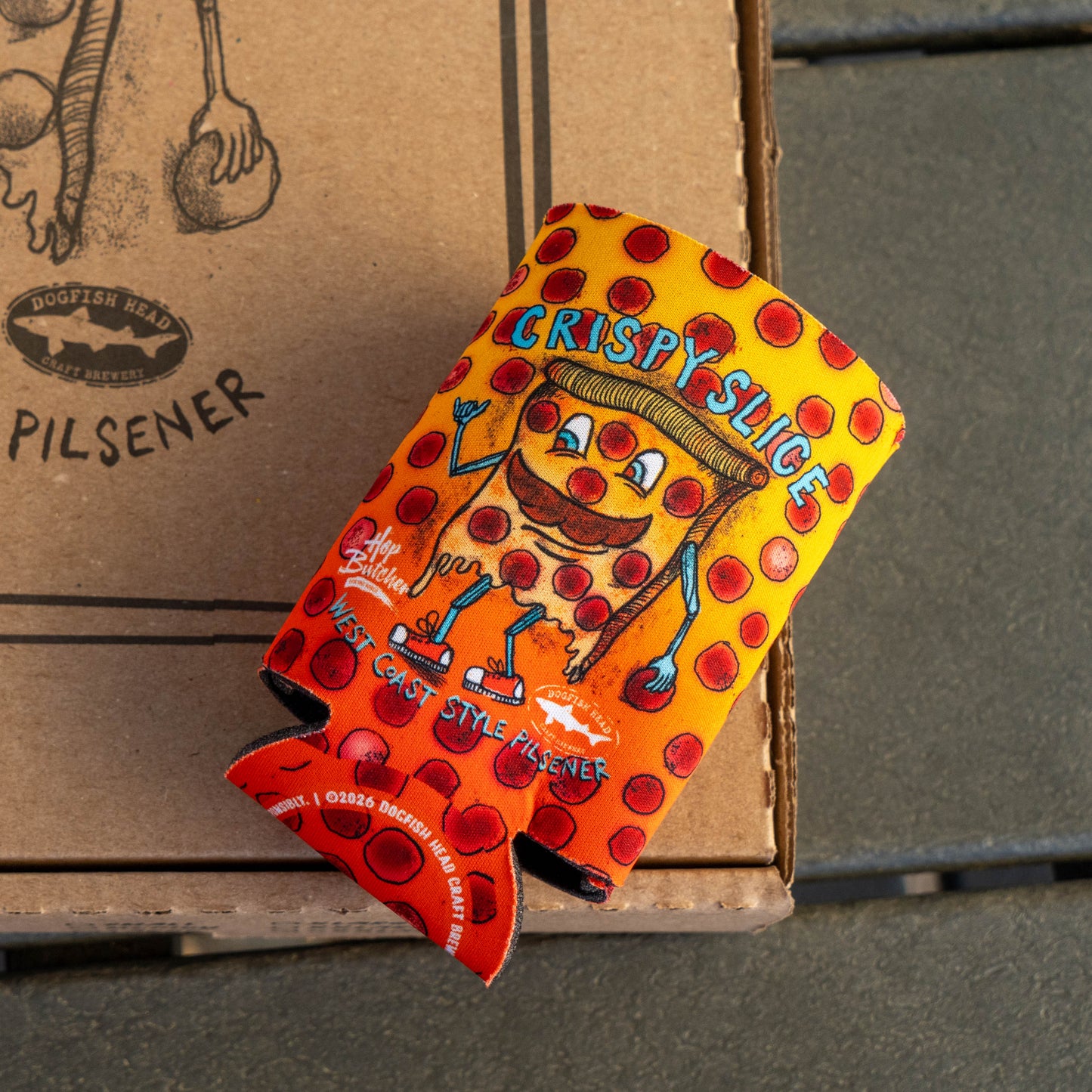 The Grandstand Glassware & Apparel Crispy Slice 12oz Can Cooler features a cartoon pizza slice design and "Crispy Slice" text, perfectly fitting any 12 oz can to keep your drink cold.
