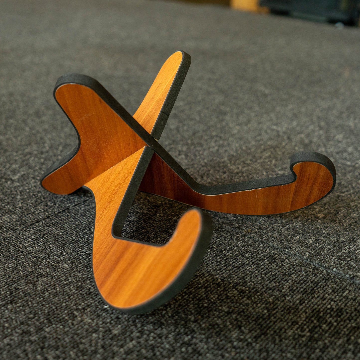 Wooden stand on a textured surface