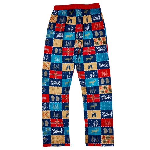 Pajama pants with a repeating square pattern with artwork featuring the Sam Adams logo, beer steins, deer, trees, and other holiday themed prints. Pattern is angry orchard blue, samuel adams navy, firetruck red, and tan.