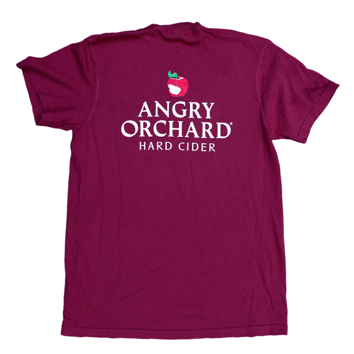 Backside of Burgundy Pocket Tee Short Sleeve. On the pocket in white text reads "Angry Orchard Hard Cider" with a red angry orchard apple logo centered right above the text