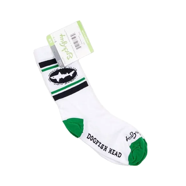 White socks that are green at the toes and heel. The body of the sock features a thick black line followed by a thin green one, the Dogfish Head shark and shield logo and followed by the black and green lines again.