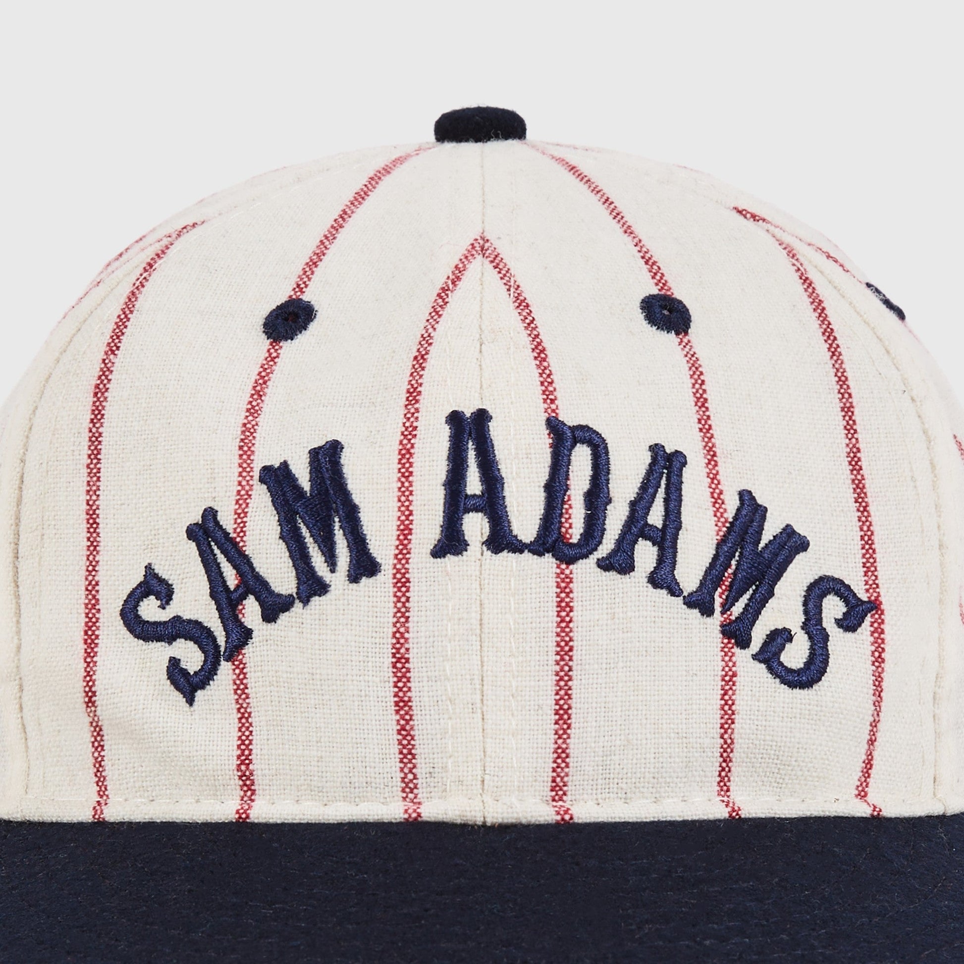 Baseball cap with 'Sam Adams' branding on a white background