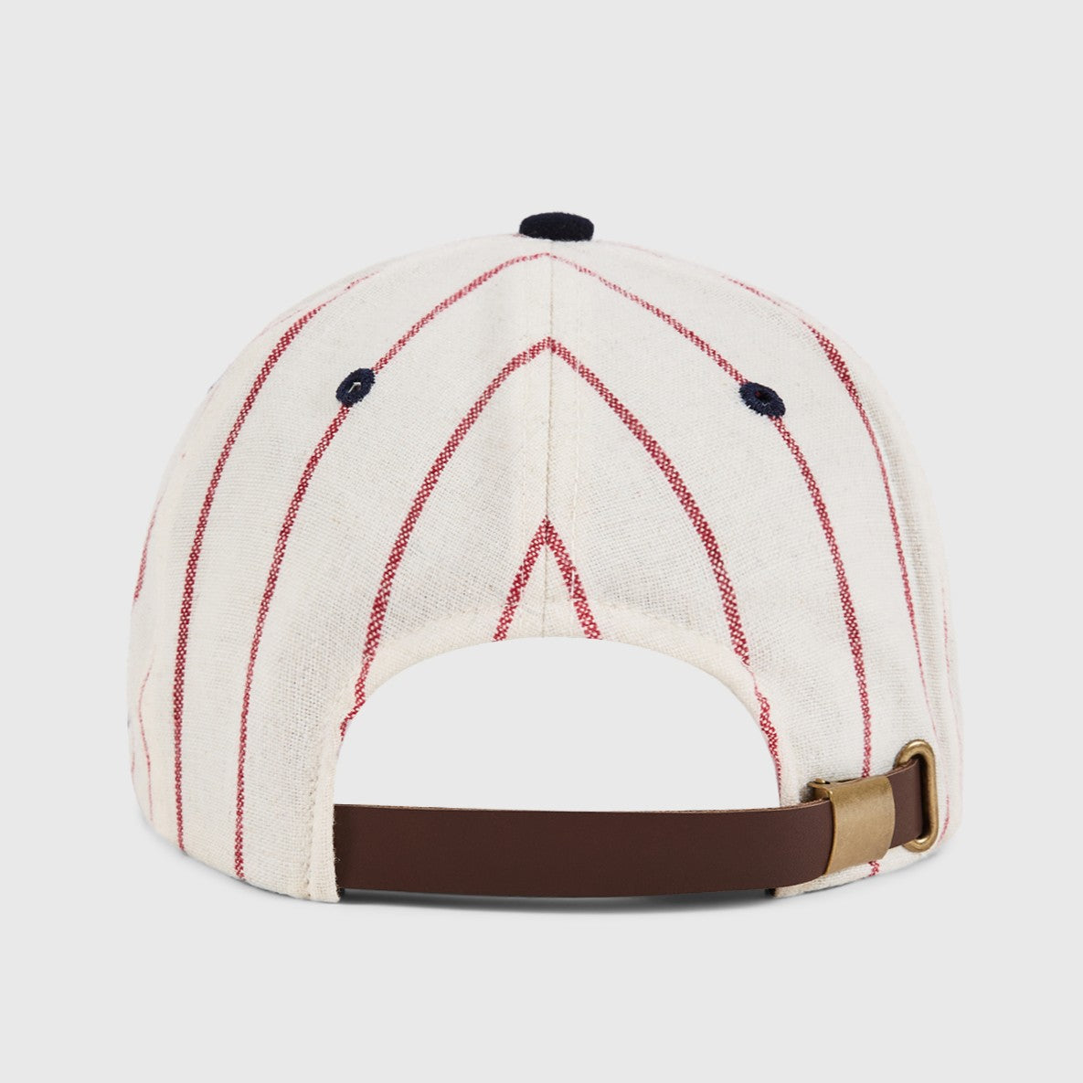 Baseball cap with red and white striped pattern on a light gray background