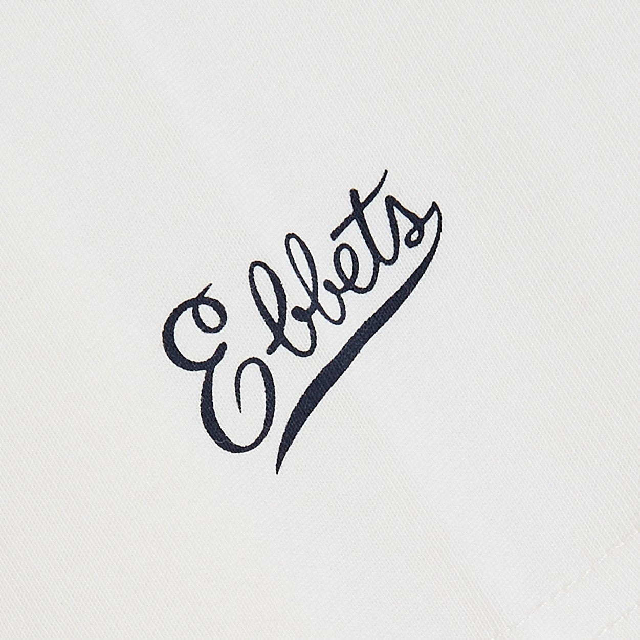 Handwritten 'Ebbets' on a white background