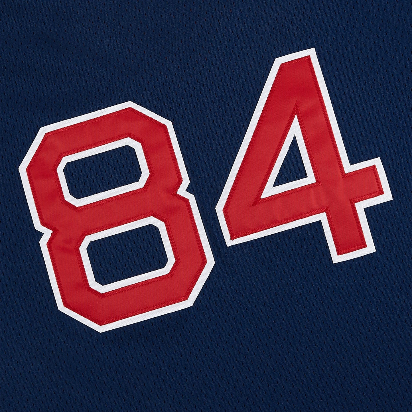 Red number 84 on a blue background