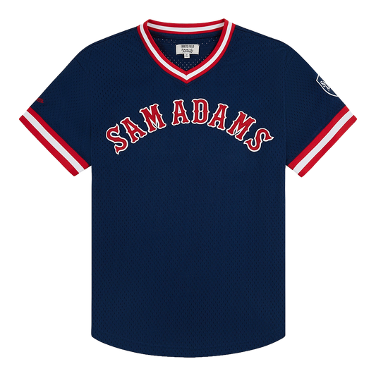Navy blue baseball jersey with red and white trim featuring 'Sam Adams' branding on a white background.
