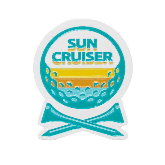 Sun Cruiser golf ball marker with colorful sunset, ocean waves, and crossed clubs design