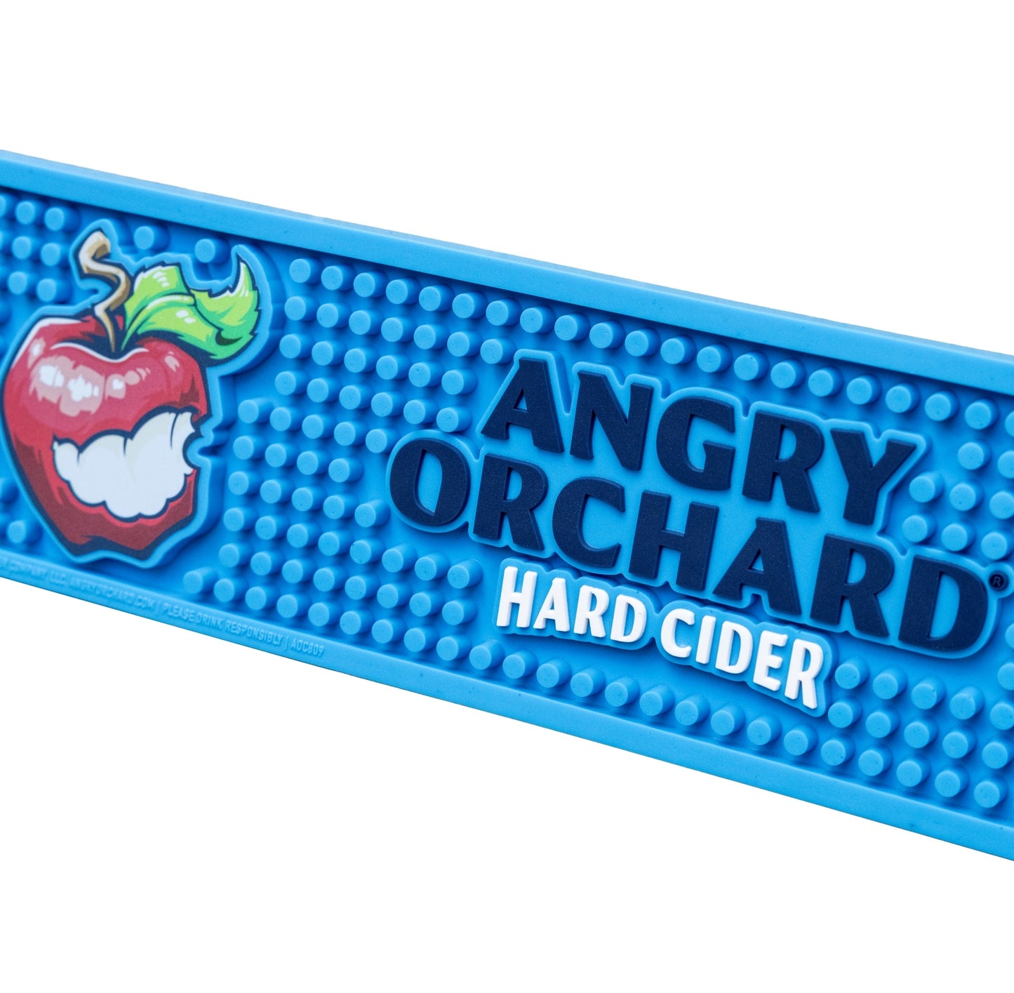 Close‑up of Angry Orchard blue rubber bar mat showing hard cider logo and textured grip detail