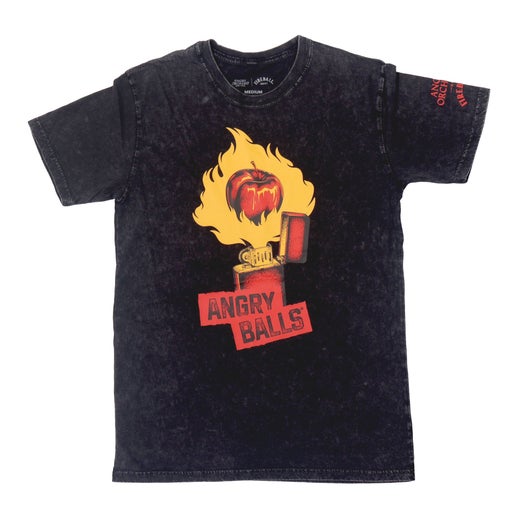 This washed black tee features a red lighter with a yellow flame being released. In the flame is a red apple, and under the lighter is writing "Angry Balls". On the left arm is the writing "Angry Orchard x Fireball".