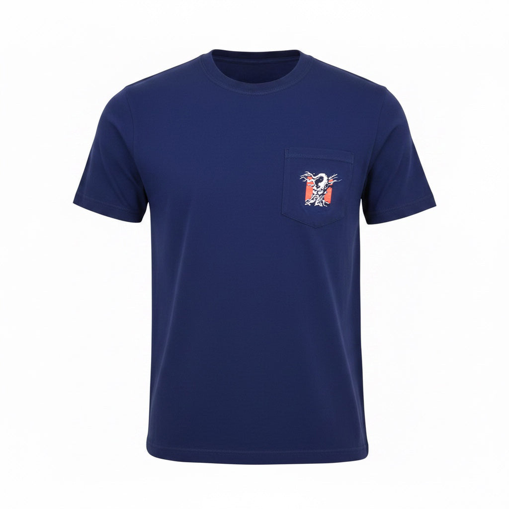 A blue crewneck tee shirt with a pocket .The pocket has the Angry Orchard Tree logo against a red square. The shirt is laid flat against a white background. 
