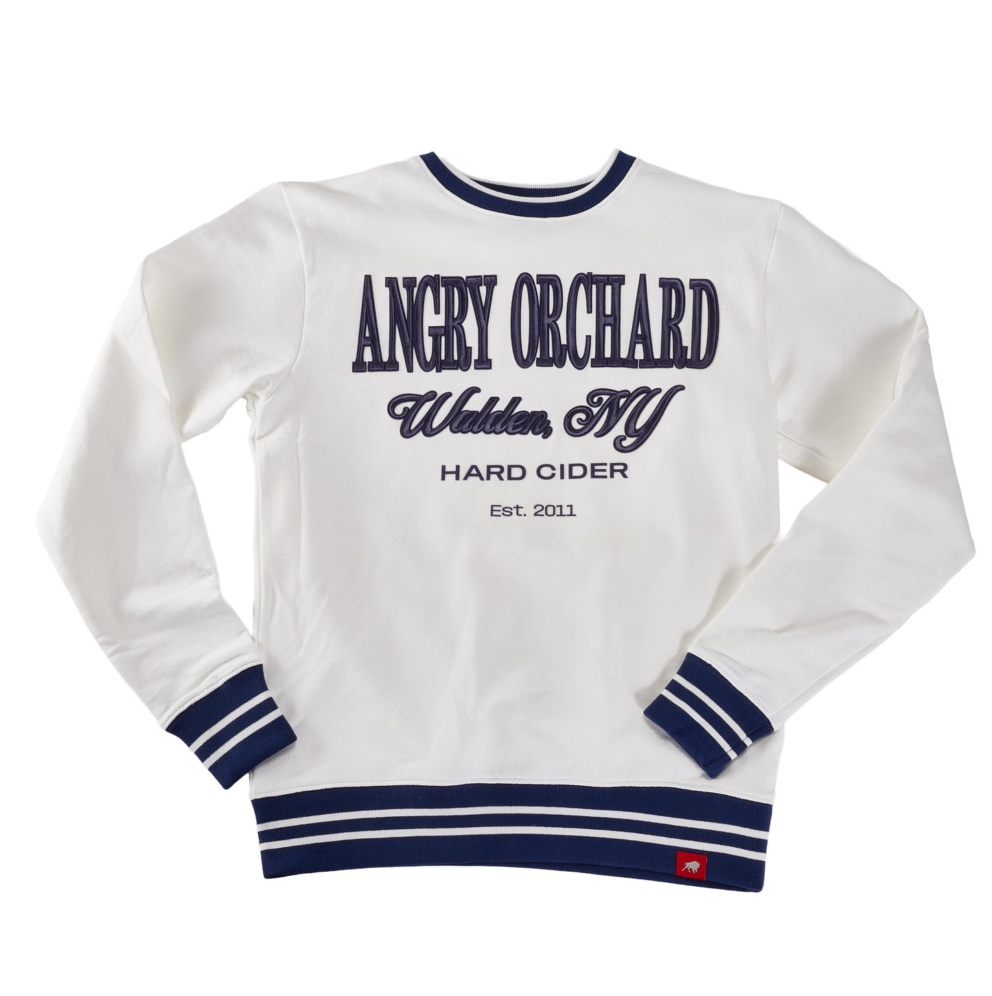 Angry Orchard White Walden Crew Sweatshirt—front view showing navy embroidered text “ANGRY ORCHARD,” “Walden, NY,” “HARD CIDER,” and “Est. 2011,” with ribbed crewneck, cuffs, and hem featuring navy stripe accents; premium hard cider apparel.