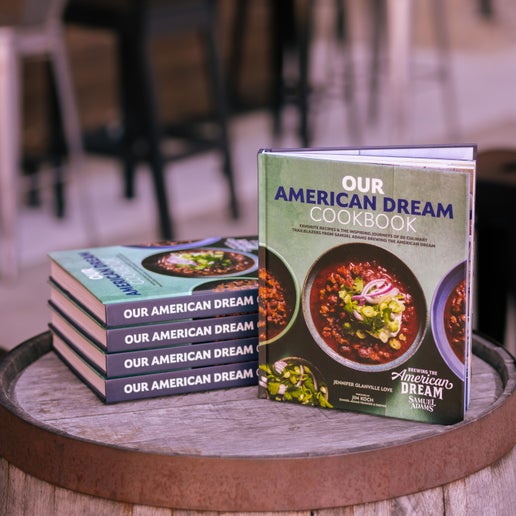 The cover of Our American Dream Cookbook, which features 80 Culinary Trailblazers who share their favorite recipes and inspiring stories, celebrating innovation, entrepreneurship, and the spirit of American ingenuity.
