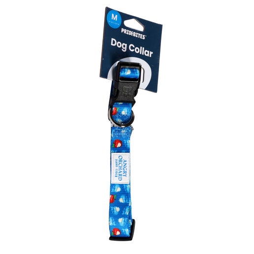 Blue dog collar with black hardware. Collar is covered in the iconic Angry Orchard bitten red and blue apples. Has small white patch on it with writing "Angry Orchard Hard Cider".