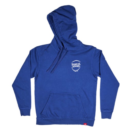 Front and back view of a blue Samuel Adams hoodie. The front features a small white Samuel Adams shield logo on the left chest; the back displays a bold white "Here for the Beer" graphic with the Samuel Adams logo underneath.