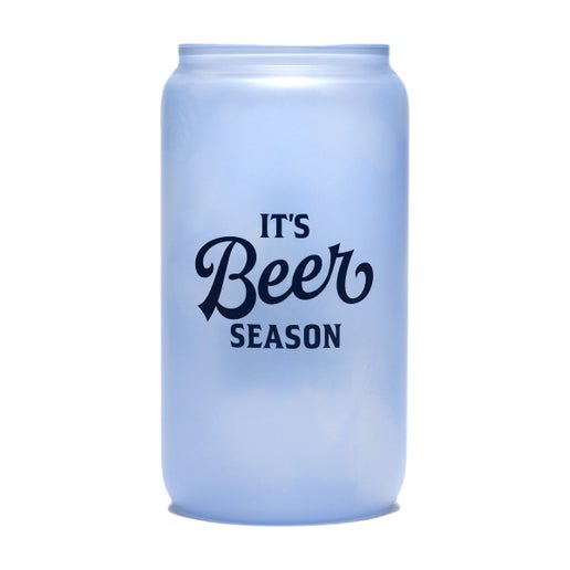 A frosted glass with the phrase "It's Beer Season" in navy printed on one side of it that changes color to a blue when it comes into contact with cold.