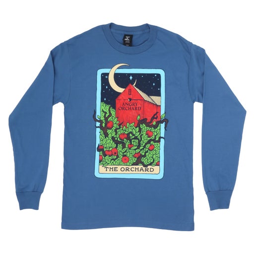 Front of the blue long sleeve tee features a design of a moonlit orchard displayed on a tarot card. The tarot card name is included which is "The Orchard".