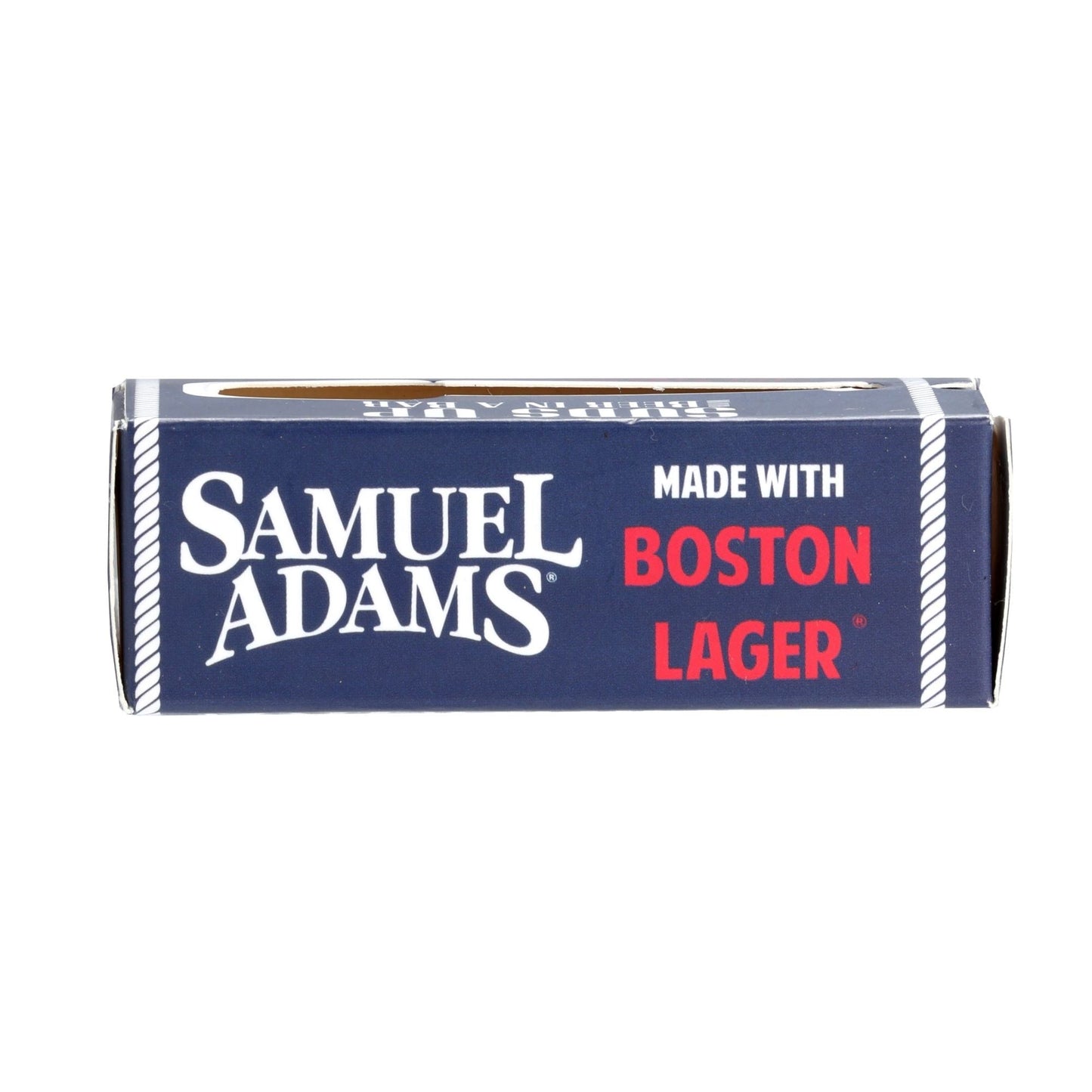 Our Beer soap made with Samuel Adams Boston Lager has a clean men's cologne scent. The soap is packaged in a navy blue box with white text and white and red details.