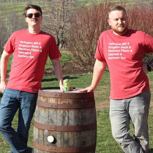 Front of tee is red with writing "Yarlington Mill & Kingston Black & Newtown Pippin & Dabinett & Northern Spy".