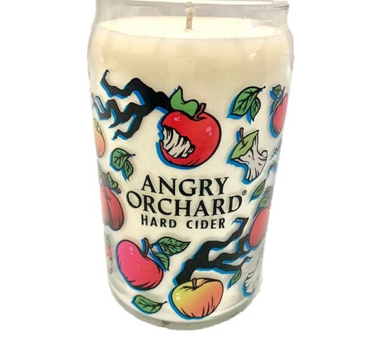 This can glass is covered in small images of branches, leaves, whole apples, and bitten apples. These small images surround the writing "Angry Orchard Hard Cider".