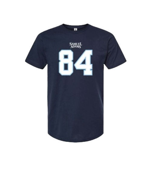 A navy blue tee shirt. Front is printed with the number 84 in white letters with light blue trim and the Sam Adams logo printed above it in white in the style of a sports jersey.