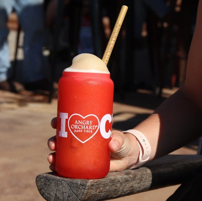 This image shows the glass which changes to red when cold and has writing "I heart cider" on it. The heart is an actual heart with writing "Angry Orchard Heart Cider" on it. 