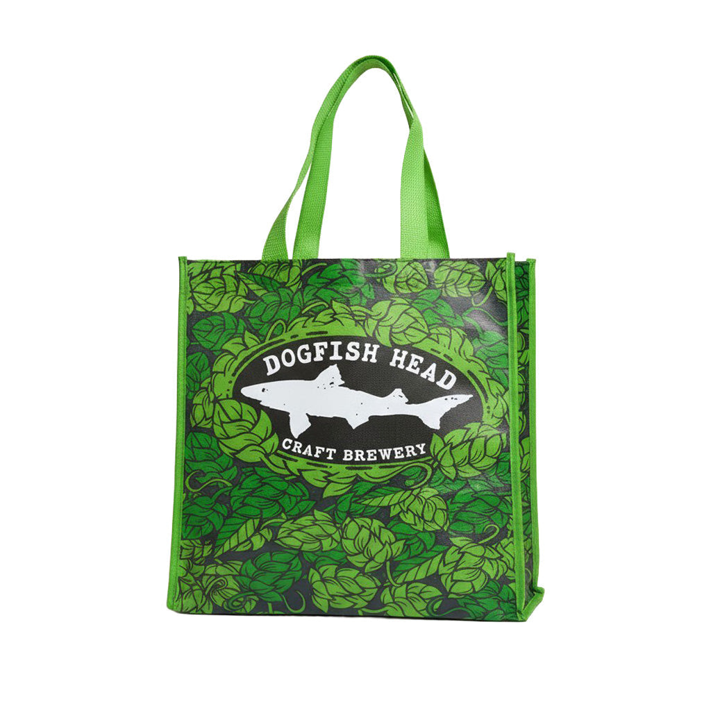 The Dogfish Head Green Shopping Tote by Arrasmith Promotions LLC features leaf patterns, two fish silhouettes, green handles and side panels—ideal as a durable grocery bag or beach tote.
