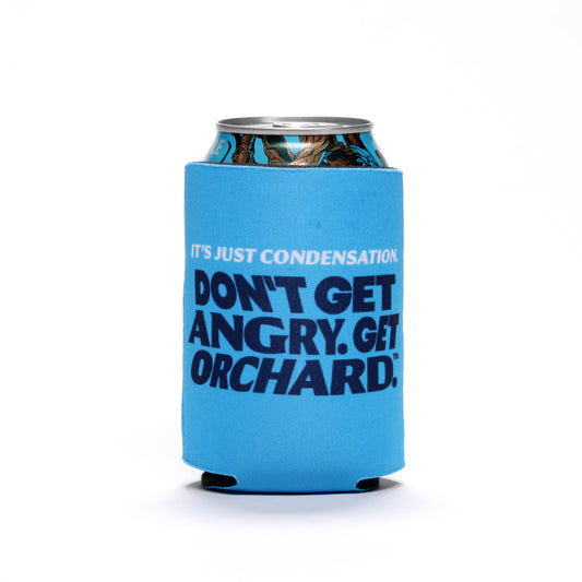 On one side of this can cooler is writing, "It's Just Condensation", "Don't Get Angry. Get Orchard." On the other side of the cooler is the writing, "Angry Orchard Hard Cider". And at the bottom of the cooler is the iconic Angry Orchard bitten red apple.