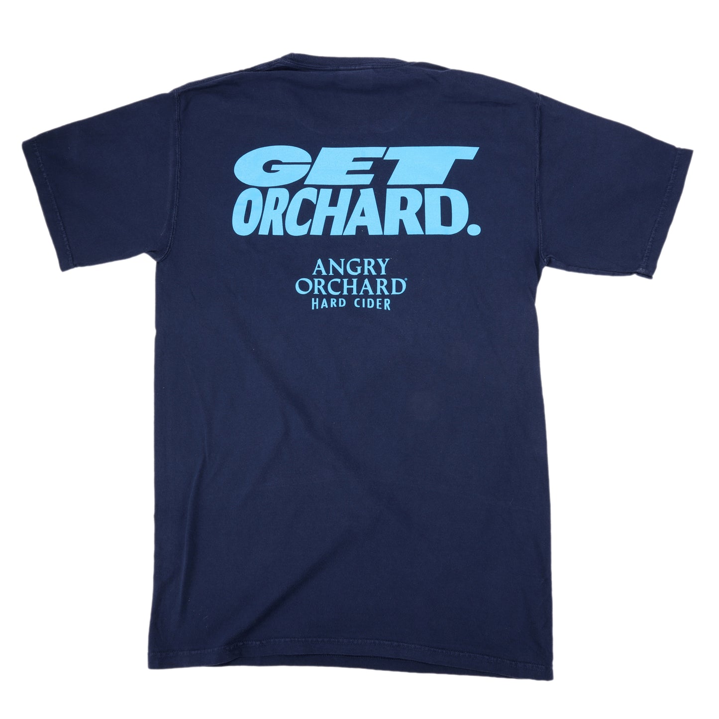 Back view of navy tee, features writing "Get Orchard." and "Angry Orchard Hard Cider" below it in light blue.