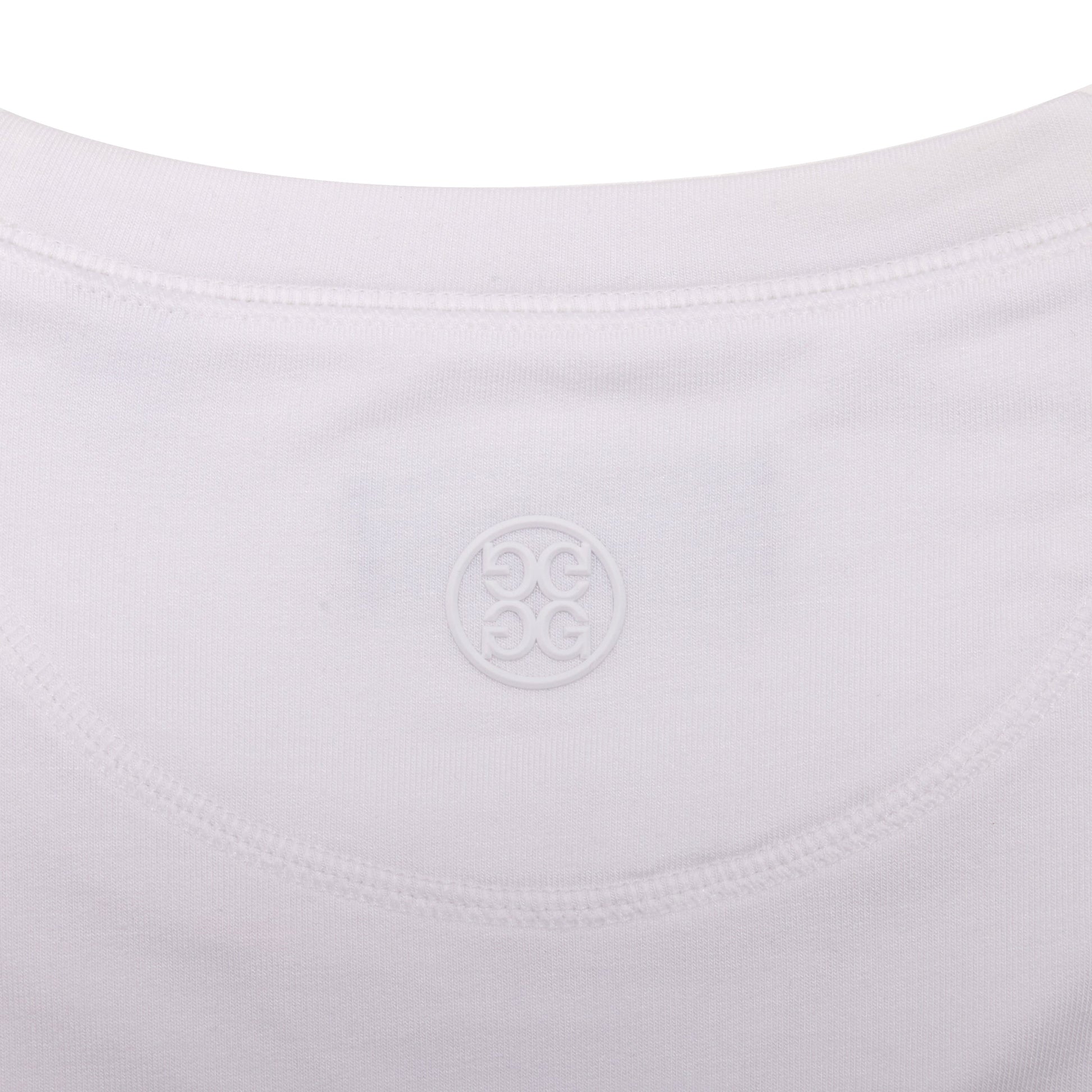 Close-up of the back neckline of Sun Cruiser x GFORE white lightweight terry crewneck showing soft fabric texture and tonal embossed Circle G 