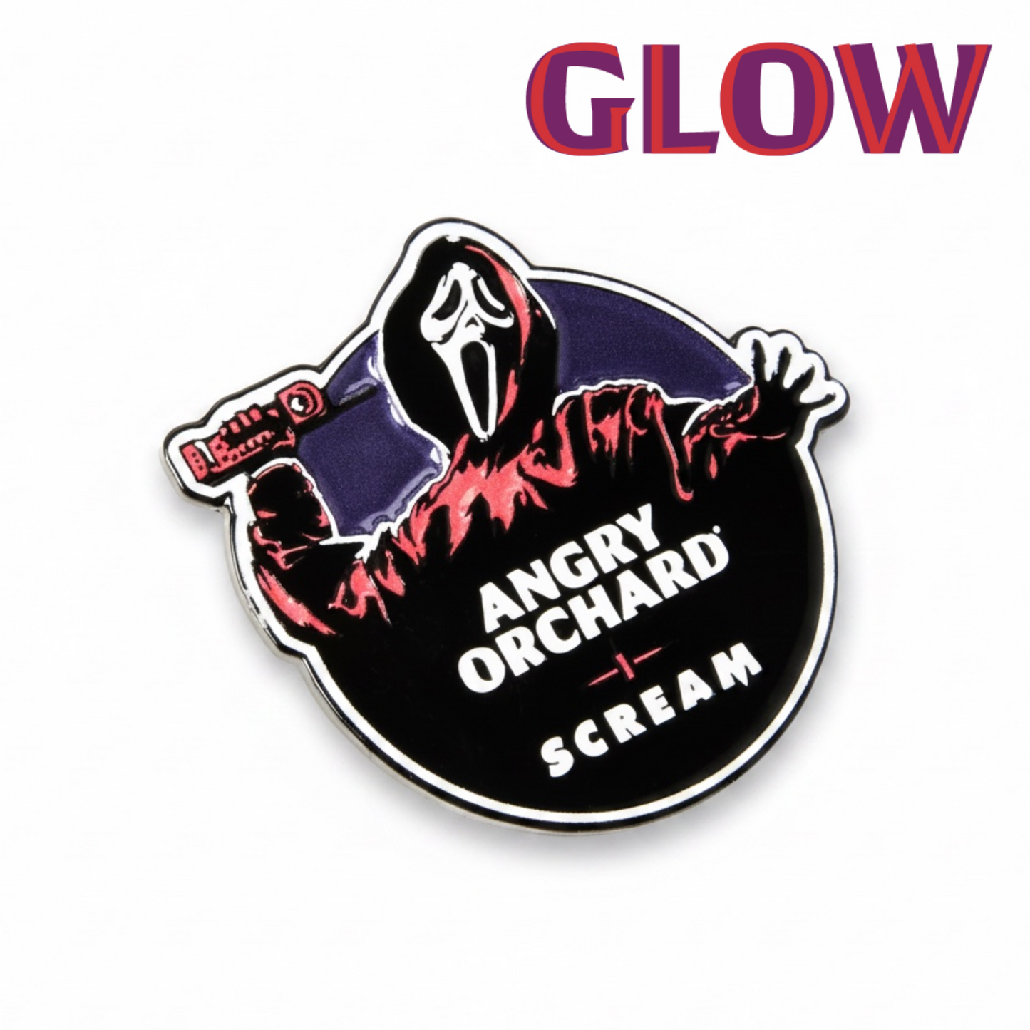 A circular enamel pin featuring a Ghostface-style hooded figure in a red hoodie holding a glowing phone, with the text 'ANGRY ORCHARD' and 'SCREAM' on a black background. The pin is shown on a white background with the word 'GLOW' in large red letters above it.