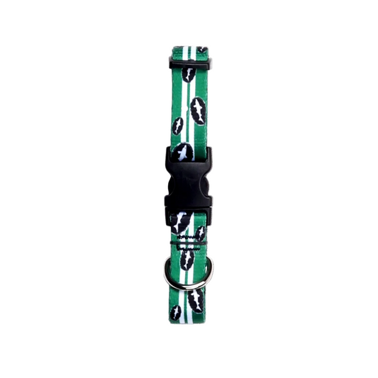 The Green Retro Collar by Lupine, Inc. is a durable dog collar with white stripes and black-and-white football designs, a black plastic buckle, and metal D-ring, shown on a white background.