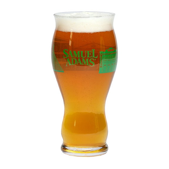 Pint glass with green skyline of Boston wrapping around the glass and a matching Samuel Adams logo 