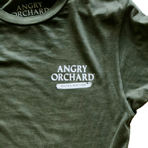 Close-up of front of tee which displays writing "Angry Orchard Walden, NY" on left side of chest. 