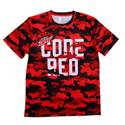 A short-sleeved athletic t-shirt featuring a red and black camouflage pattern. On the front of the shirt, the 'Hard Mtn Dew' logo is printed in the upper left chest area, followed by large, white block letters spelling 'CODE' on the first line and 'RED' directly below it, centered on the chest.