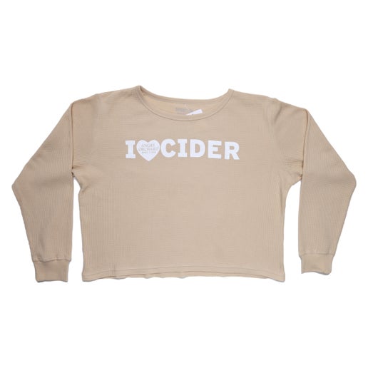 This tan tee has phrase I heart cider centered on the front. The word heart is replaced with an actual heart and has the Angry Orchard logo inside it. 