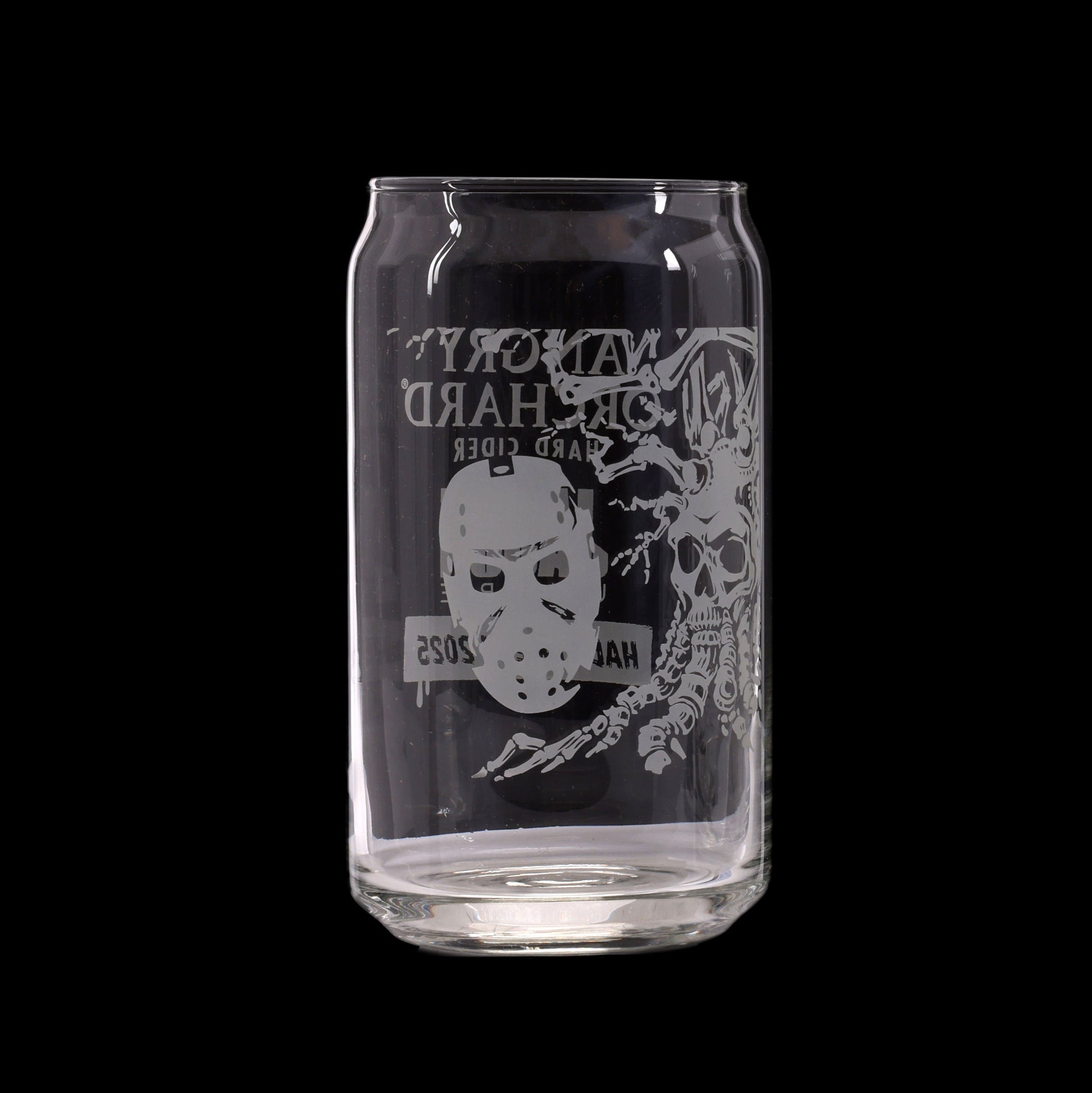 Clear glass can with black label featuring a white mask and skeleton design on a white background