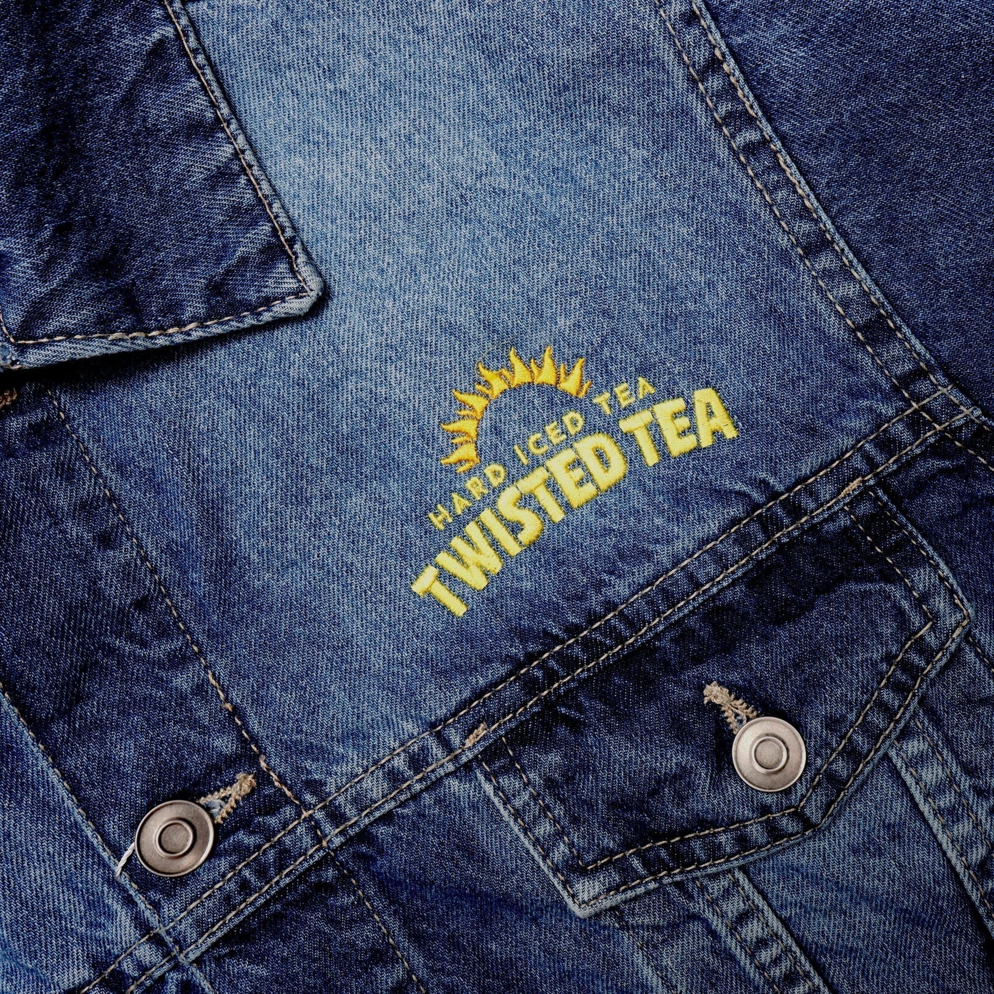 Embroidered Twisted Tea logo on a denim jacket