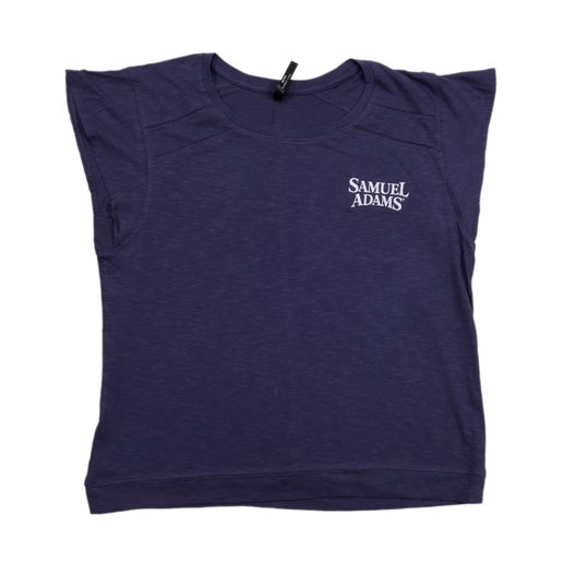Front and back views of a women's navy KUHL short sleeve tee with cap sleeves and a Samuel Adams logo printed on the front left chest.