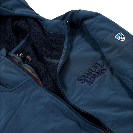 Close up of navy Samuel Adams logo on KUHL Blue Aero Fleece Pullover 