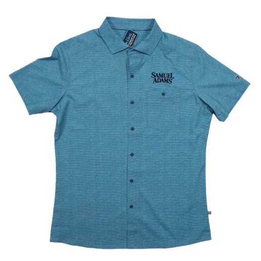 Front and back view of a light blue KUHL short sleeve button-up shirt featuring a textured pattern and Samuel Adams logo embroidered on the left chest.