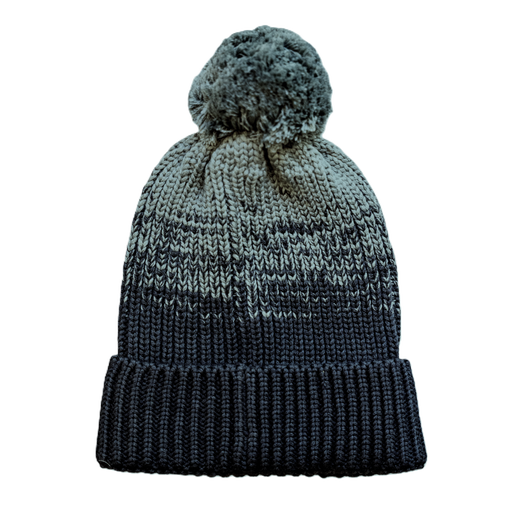 Gradient color-blocking beanie with pom-pom on top.