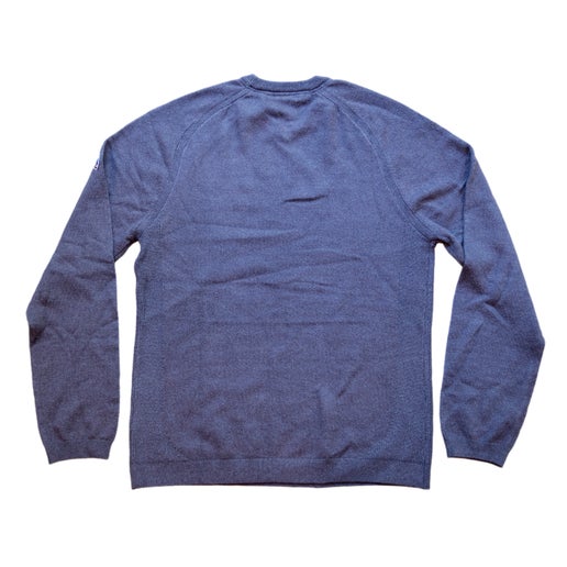 Back of solid blue sweater