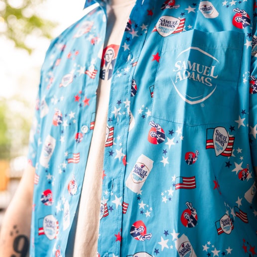 Close-up of the front pocket featuring the Samuel Adams logo on the printed pattern.