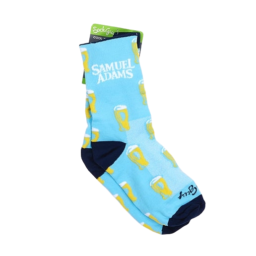 A pair of light blue socks with navy blue around the ankle, heel, and toes, also featuring a design of perfect pints around the whole sock and the Samuel Adams logo above the ankle.