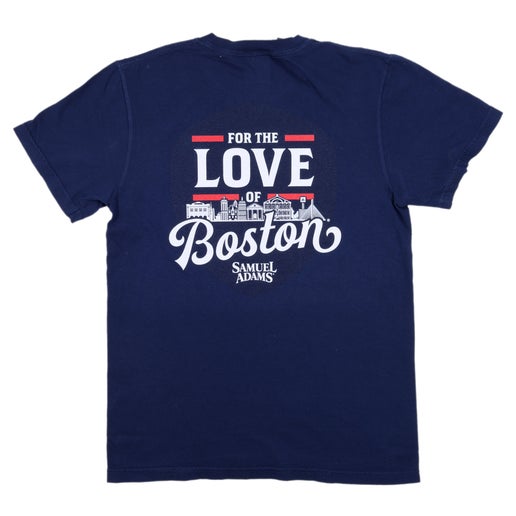 This navy tee shirt has the classic Samuel Adams "For the love of Boston" city skyline design on the back in navy, white, and red.